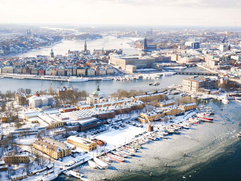 Parts of Stockholm, covered with snow, seen from above in winter.