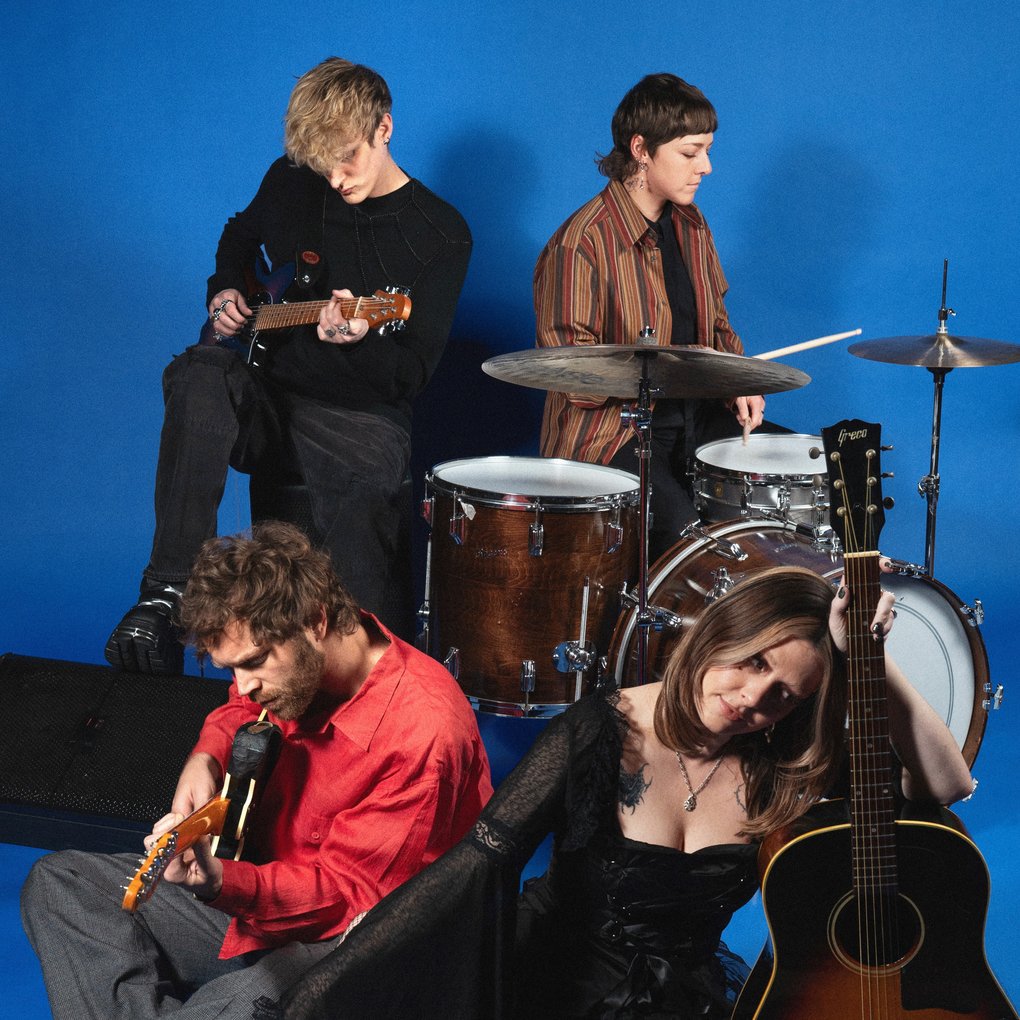 The members of Yumi Zouma with their instruments.